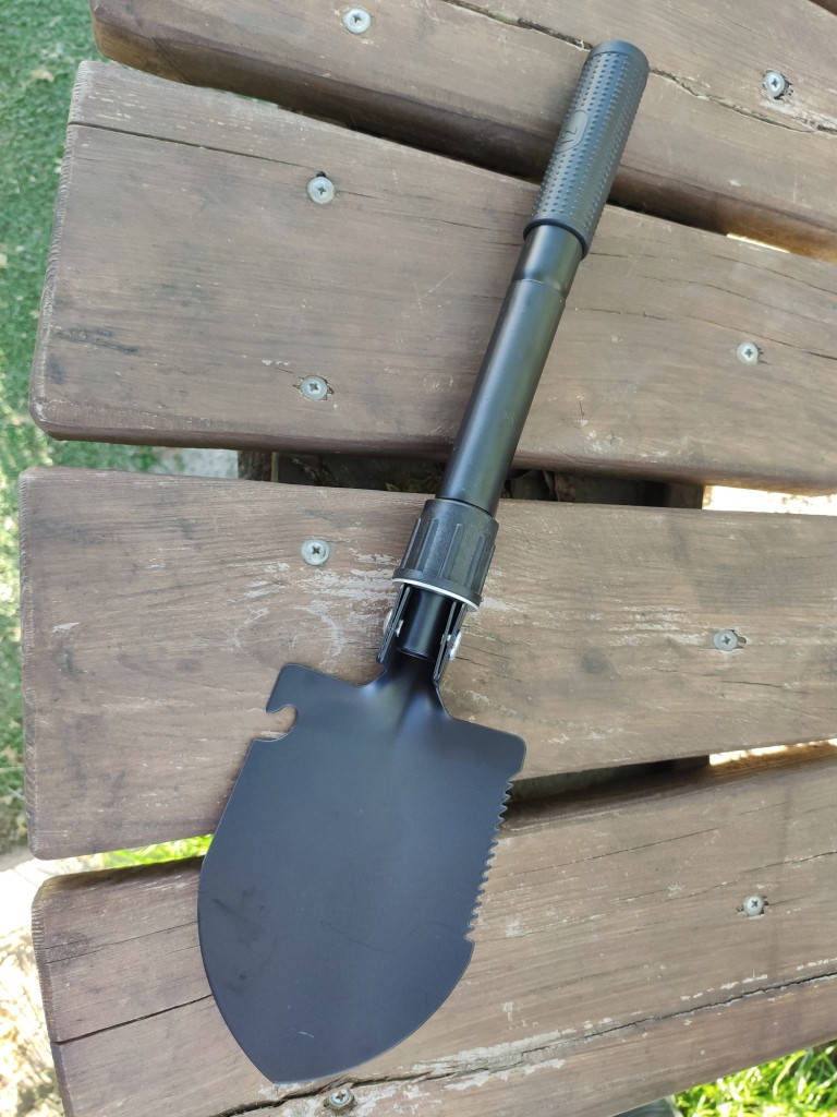 

Туристическая складная лопата 5 в 1 в чехле (кирка, пила, компас, открывалка)