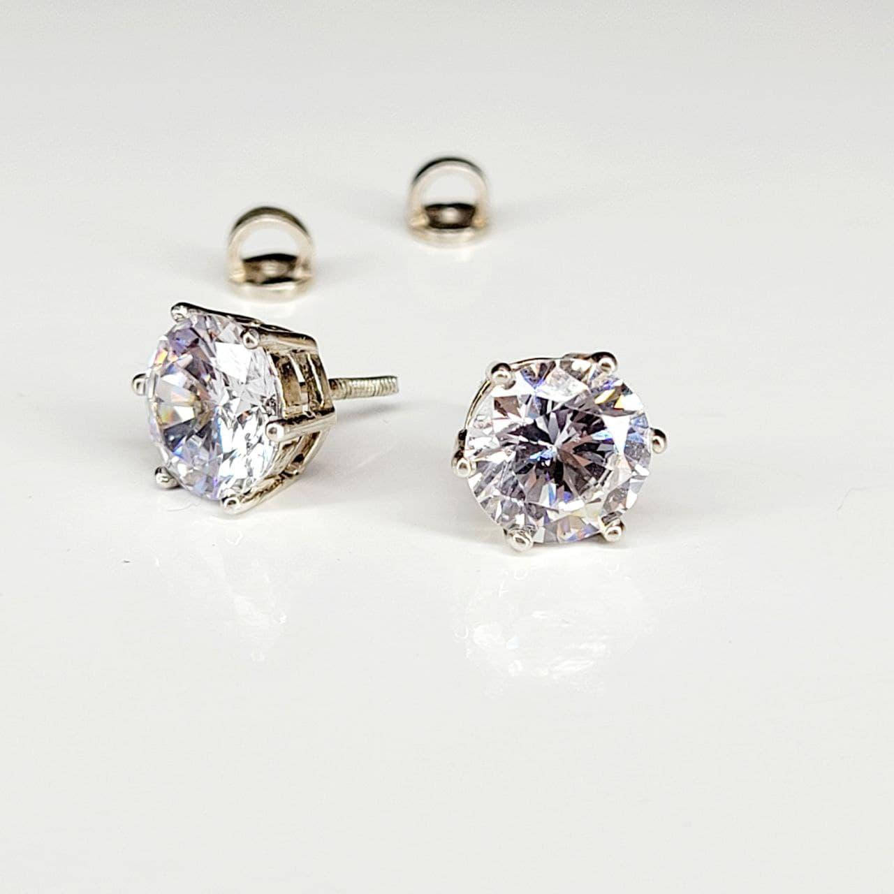 

Серебряные серьги гвоздики с фианитами диаметр 1см