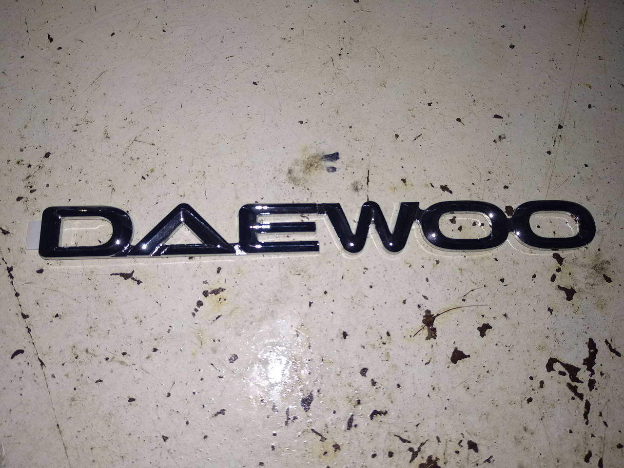 

Эмблема крышки багажника Матиз DAEWOO