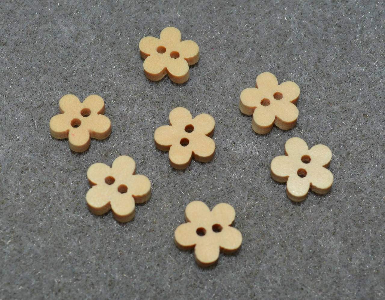 

Деревянная пуговица. цветок 11 x 11 мм