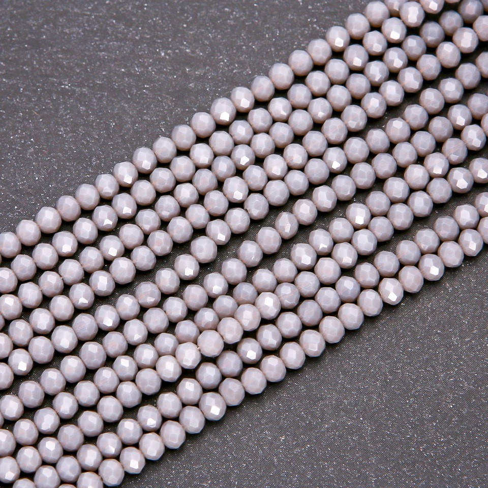 

Бусины стекло матовое серое "рондель" d-3,5х3(+-)мм нитка L-38см, Серый