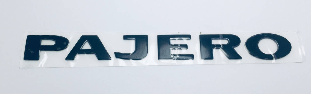 

Эмблема надпись багажника Mitsubishi Pajero чёрная