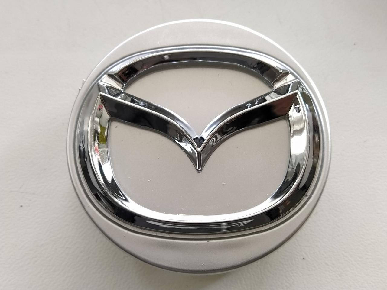 

Колпачки заглушки в литые диски Mazda 52/45/14 мм. D07A 37 190 K3954 Серебро