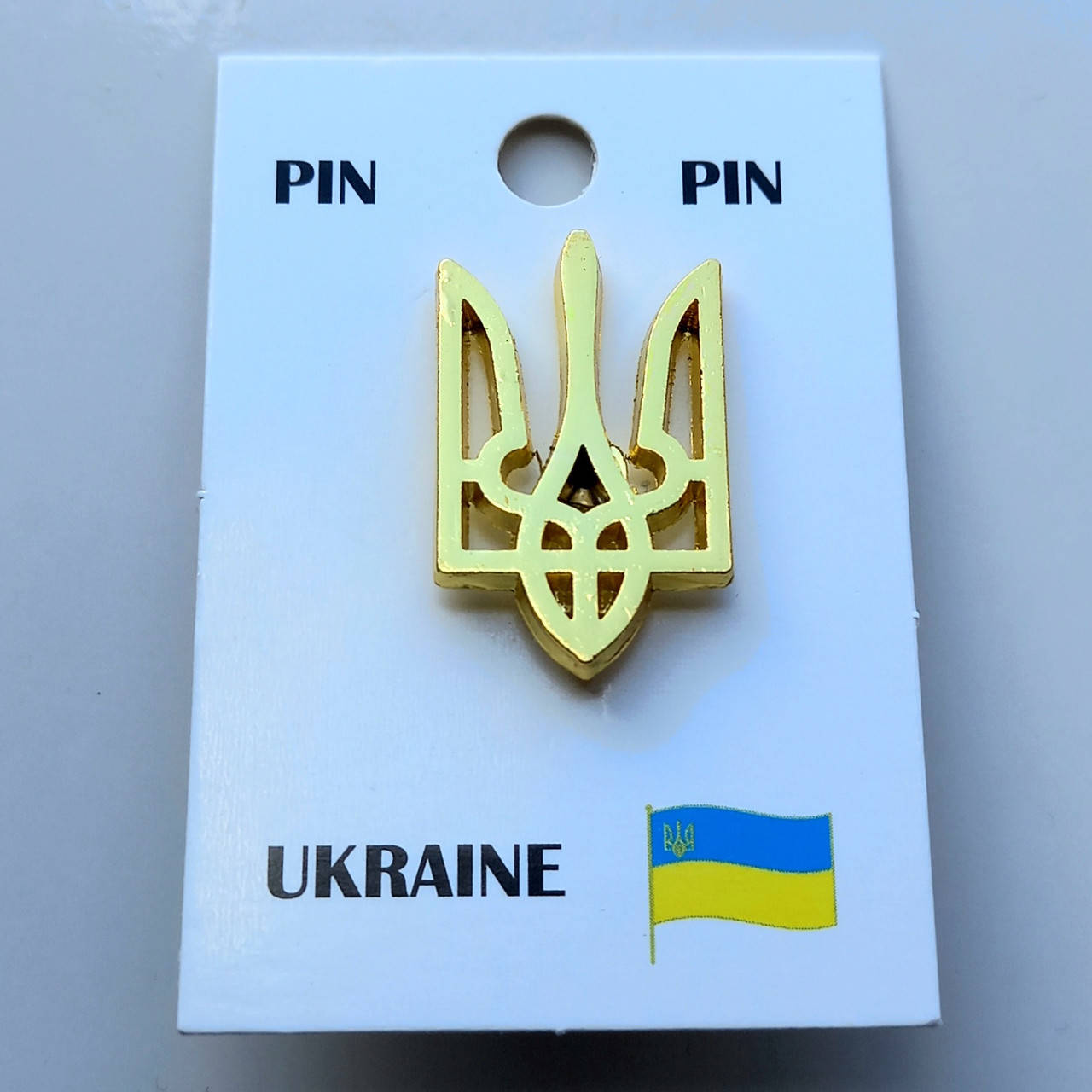 

Значок Герб Украины , под золото , 26х17 мм.