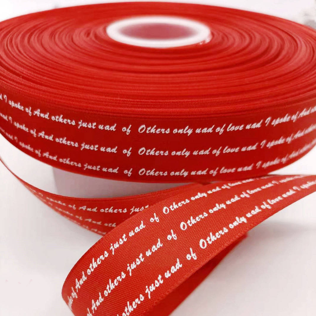 

Лента атласная с принтом "Надпись" 2,5см≈ 8,3м. Цена за рулон. Цвет - красный