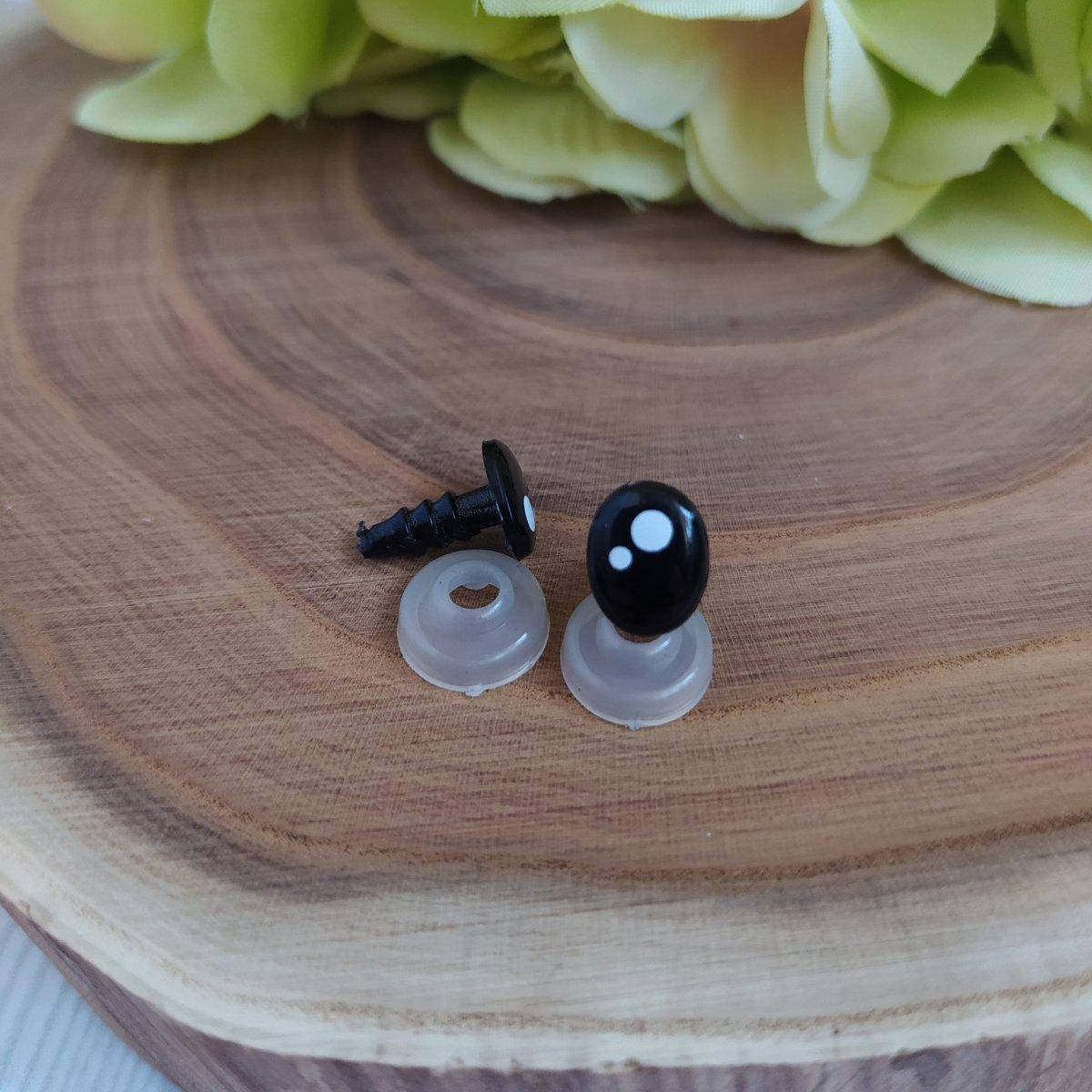 

Очі чорні з білими кружечками 7х9мм