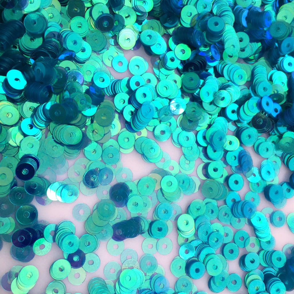 

Пайетки Турция 4 мм. Бирюзовый (радужный полупрозрачный). Круглая плоская. Упаковка 5 гр., Голубой