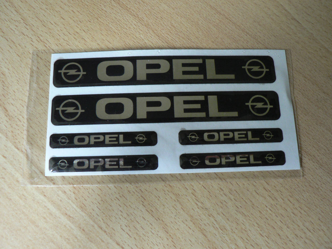 

Наклейка s маленькая Opel набор 6шт (2шт-11х1,5см и 4шт 5х0,7см) силиконовая надпись на авто эмблема Опель