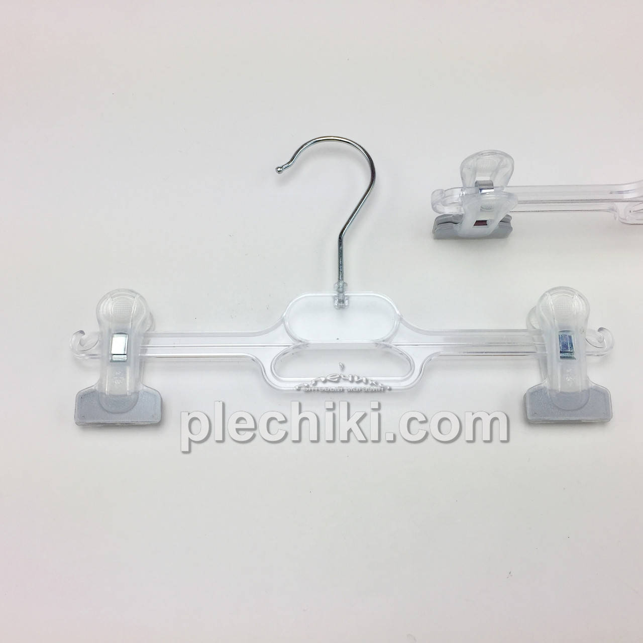 

Пластмассовые детские вешалки для брюк и юбок W-BN26 прозрачного цвета, длина 260 мм