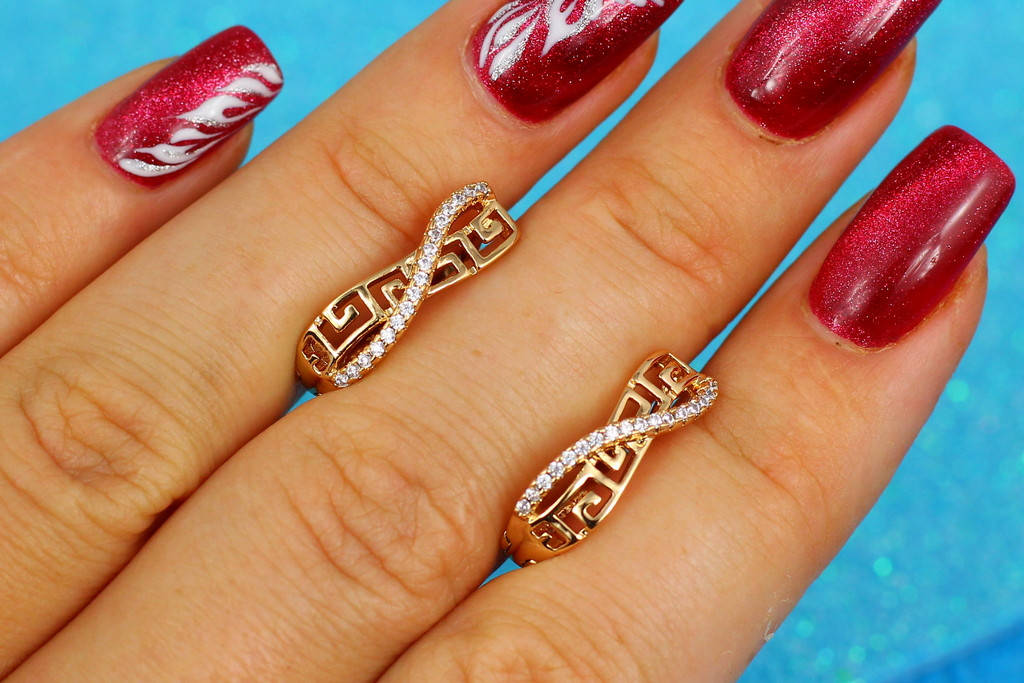 

Серьги Xuping Jewelry греческие восьмерочки 1,8 см золотистые