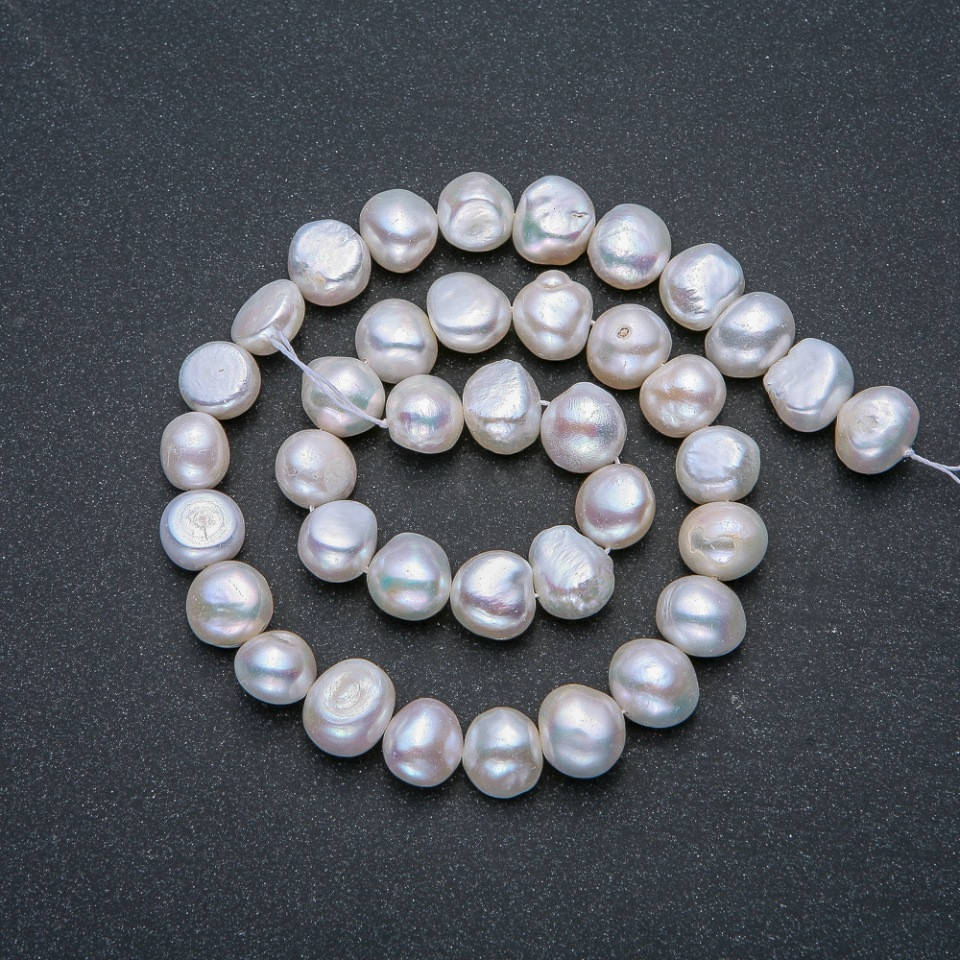 

Нитка Речного Жемчуга d-8х9мм L-36см +- с отливом бензин