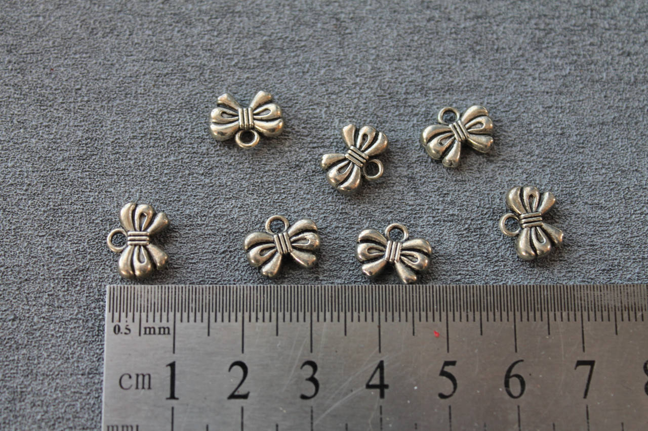 

Подвеска бантик, цвет - серебро, 1 шт