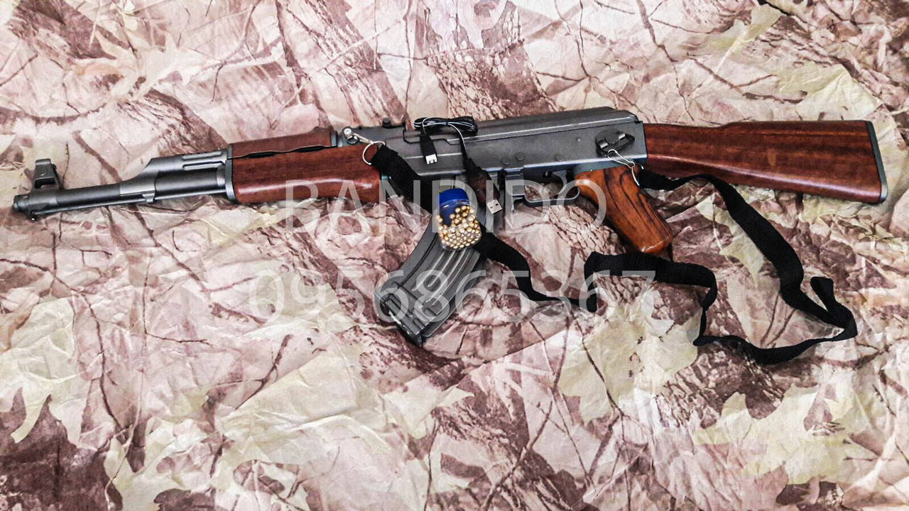 

Автоматический Автомат АК 47,пневматический,электрический с аккумулятором,стреляет очередями,на шары 6мм