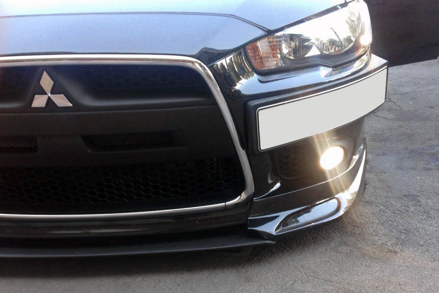 

Mitsubishi Lancer X 2008↗ гг. Подставка под номер (пластик) Черный мат