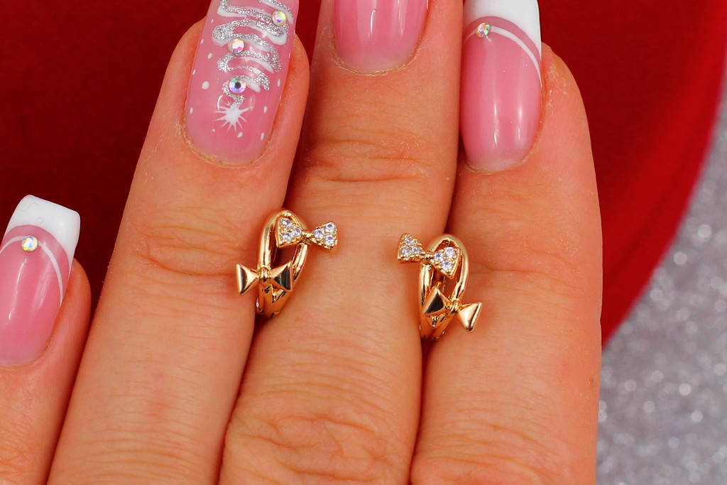 

Серьги детские Xuping Jewelry бантики 8 мм золотистые