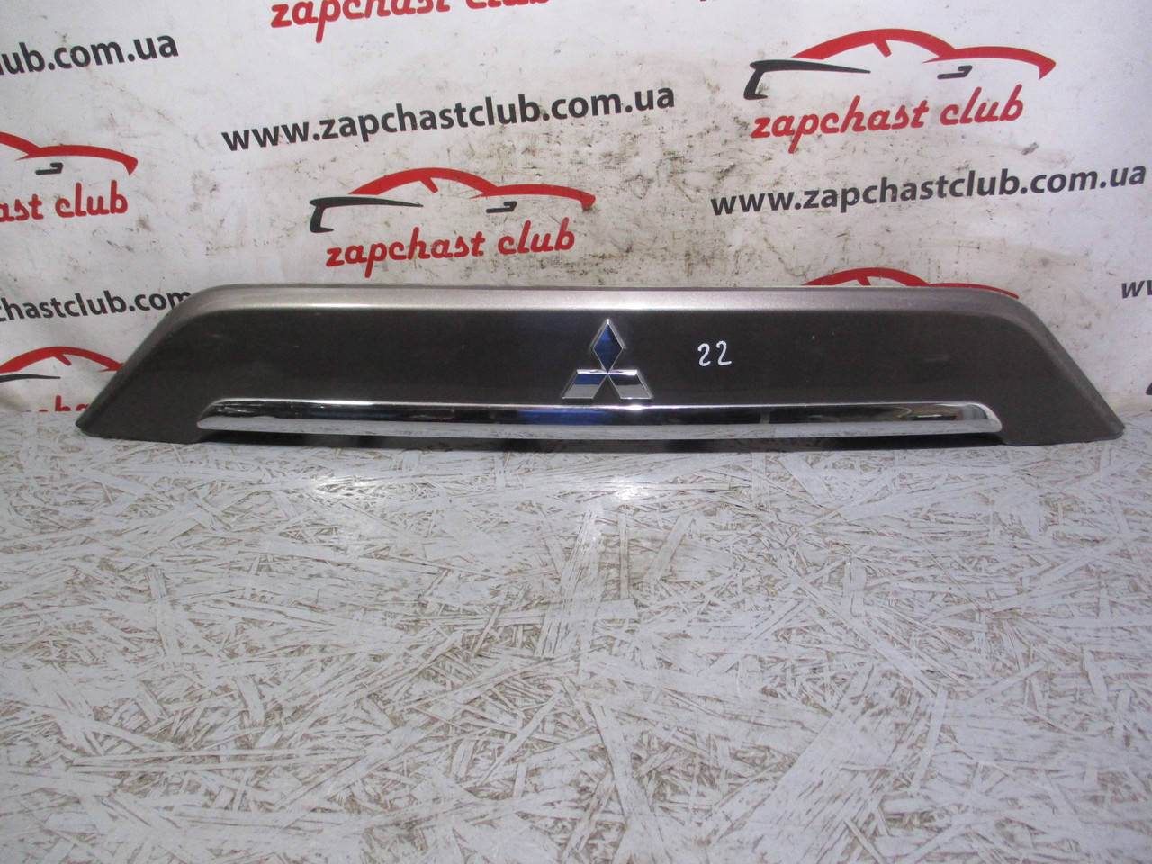 

Накладка двери багажника 5817A022, 5817A022ZZ 9917041 Outlander XL Mitsubishi