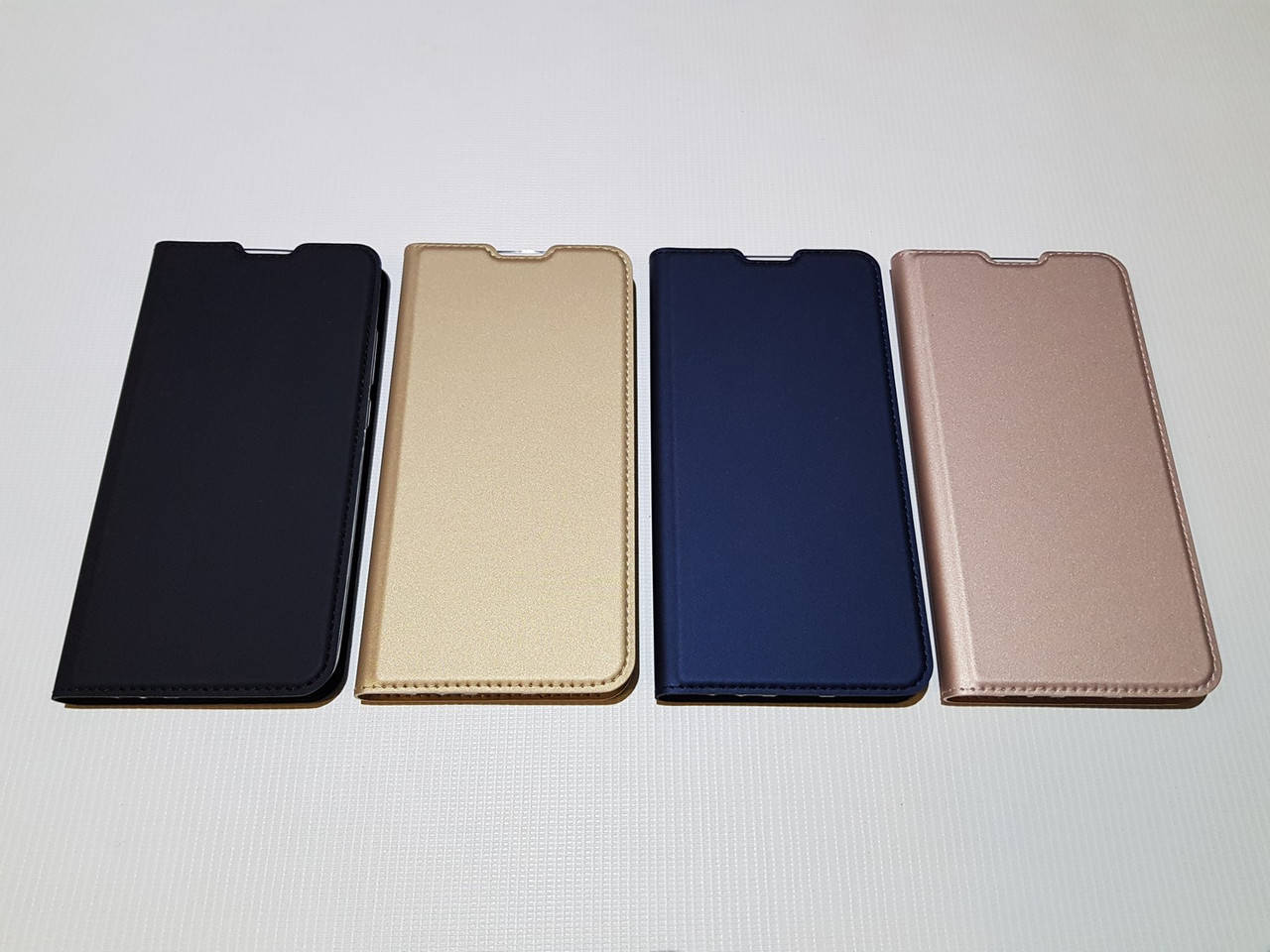 

Чехол книжка Dux Ducis для Xiaomi Redmi 8A черный, Разные цвета