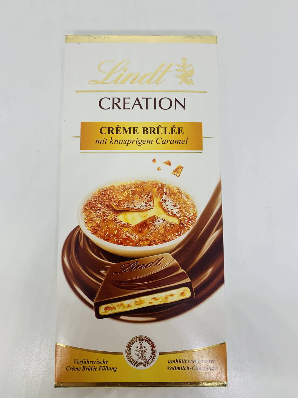 

Шоколад Lindt Creation молочный Крем-брюле 150 г Швейцария