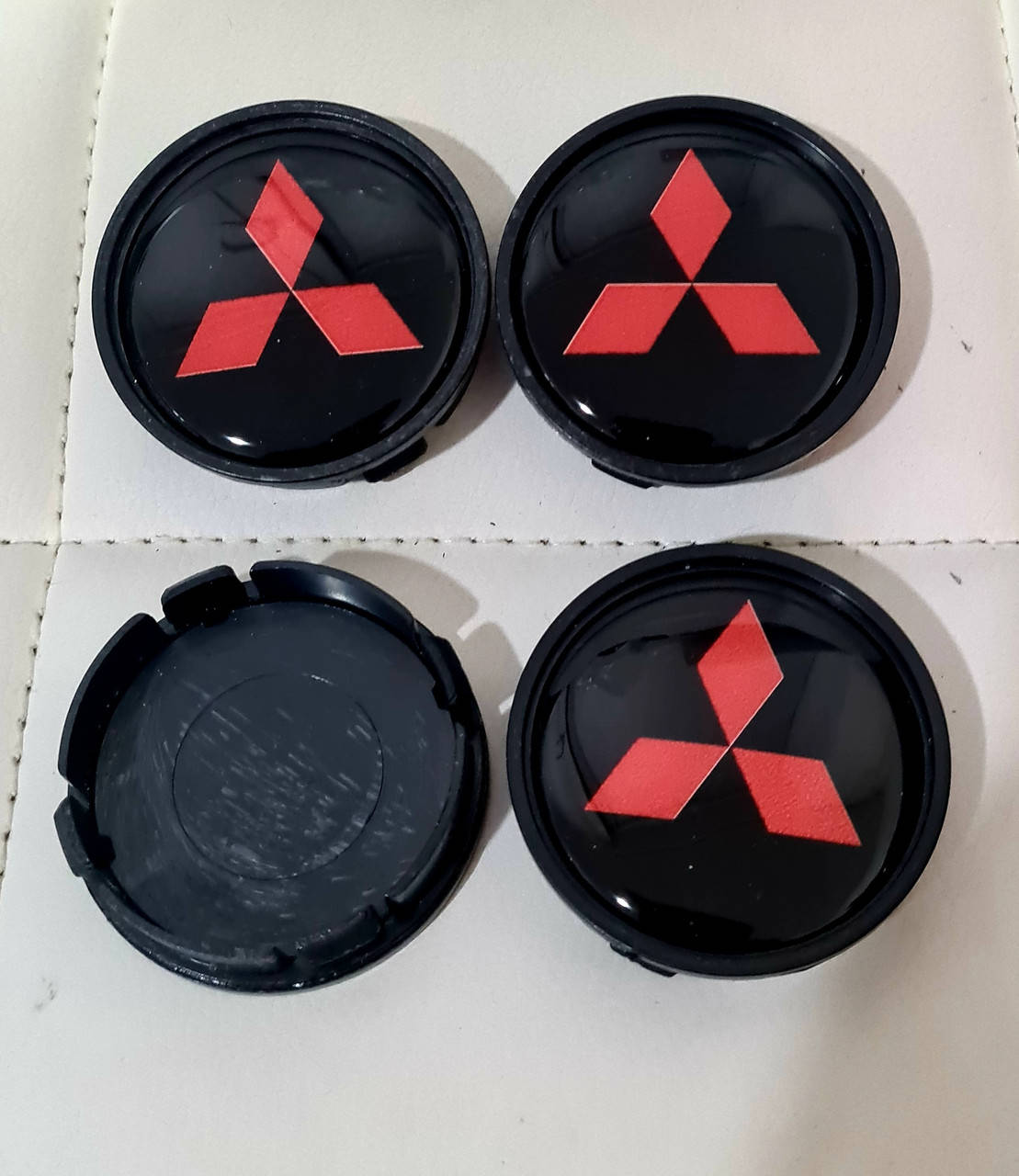 

Колпачки, заглушки на диски Mitsubishi Мицубиси 60 мм / 56 мм красные