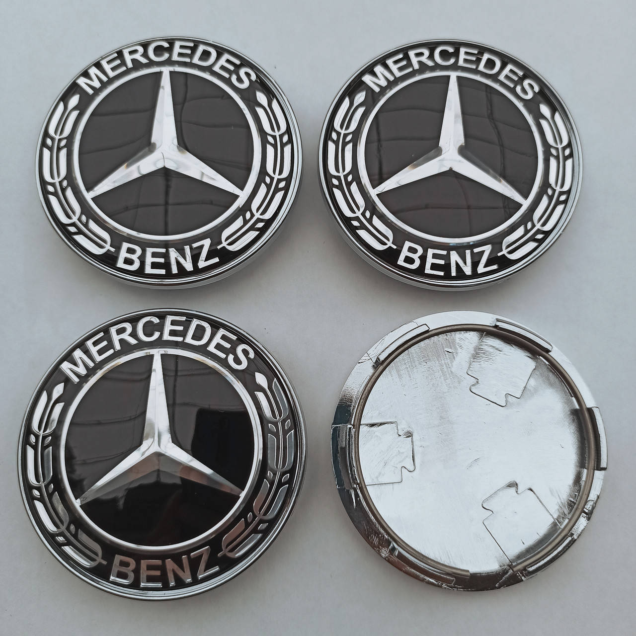 

Колпачки в диск Mercedes Benz 62-68 мм черные