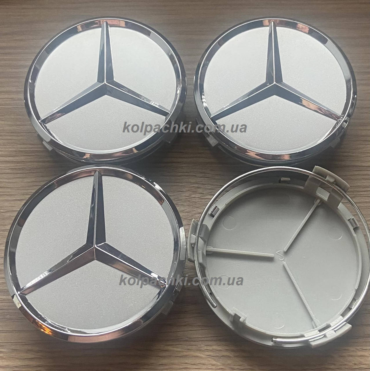 

Колпачки в диски Mercedes A1704000025 (серебро)75мм 70 мм