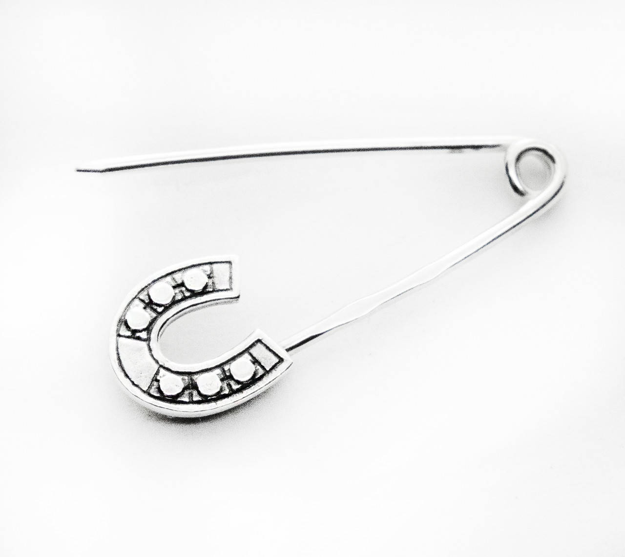 

Булавка серебряная Подкова