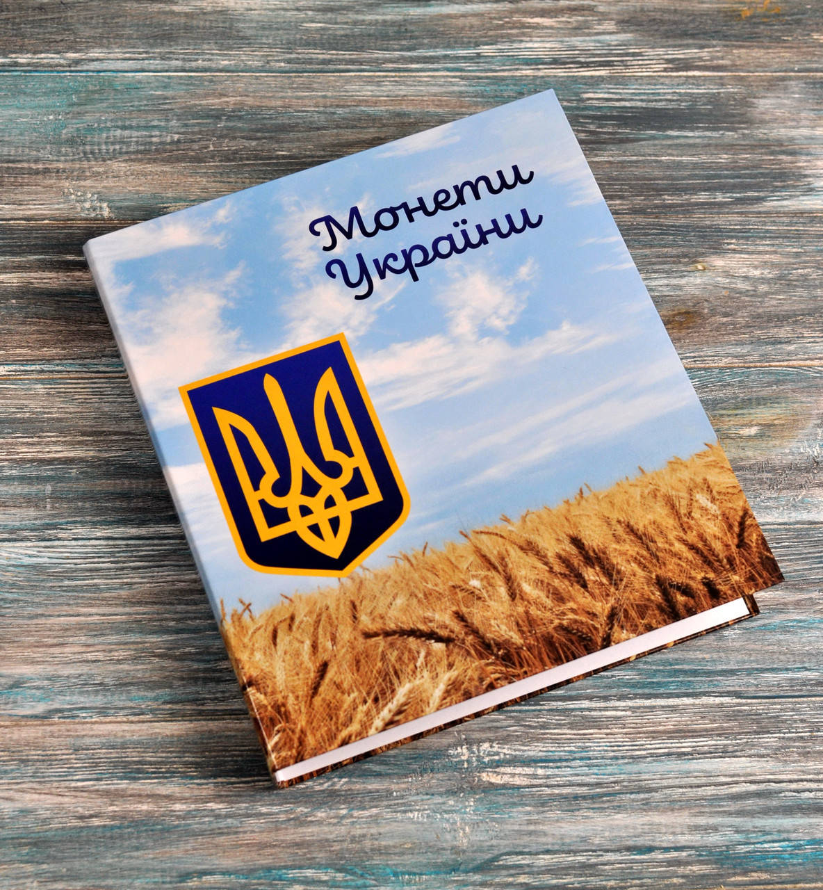 

Папка для колекції "Монети України" під листи Optima (4 кільця) 241*270*40 мм