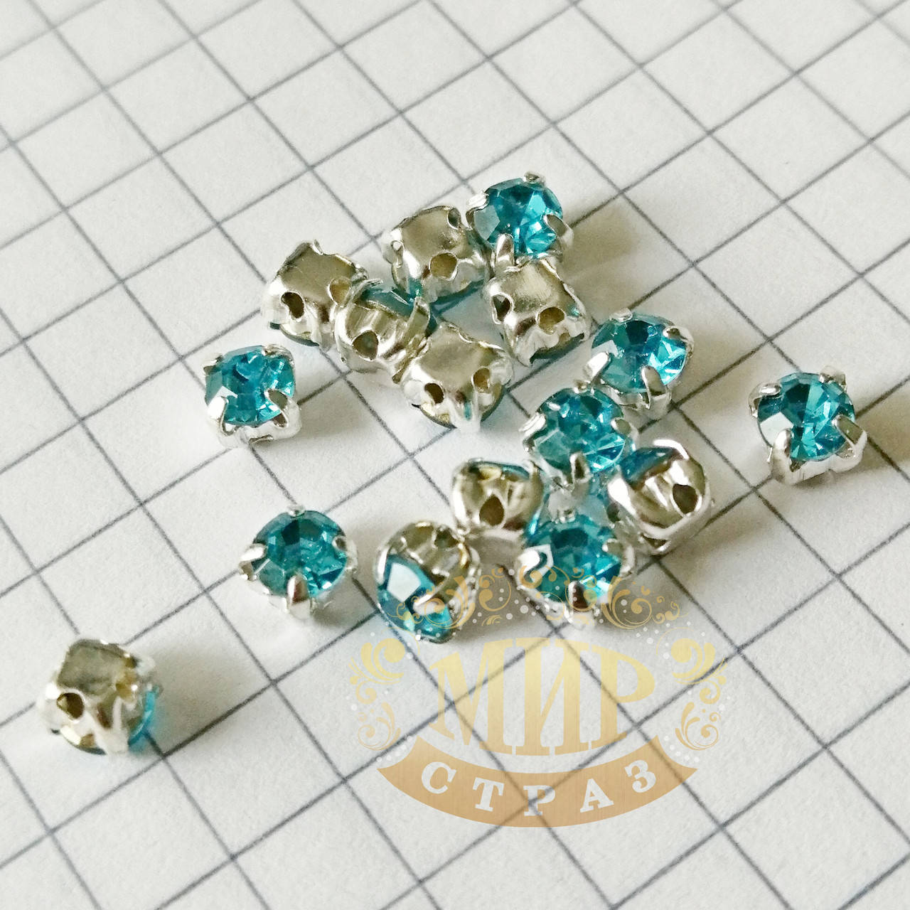 

Круглые стразы чатоны в серебряных цапах, размер 4мм, цвет Aqua, 1шт, Красный