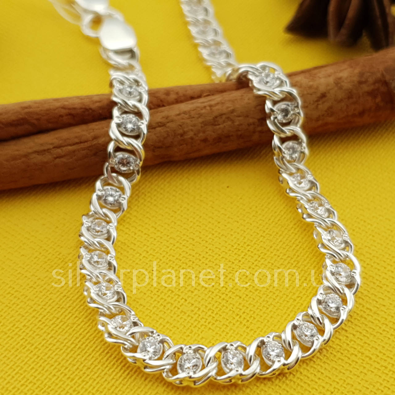 

Женский серебряный браслет арабка с камнями фианитами. Длина 18 см