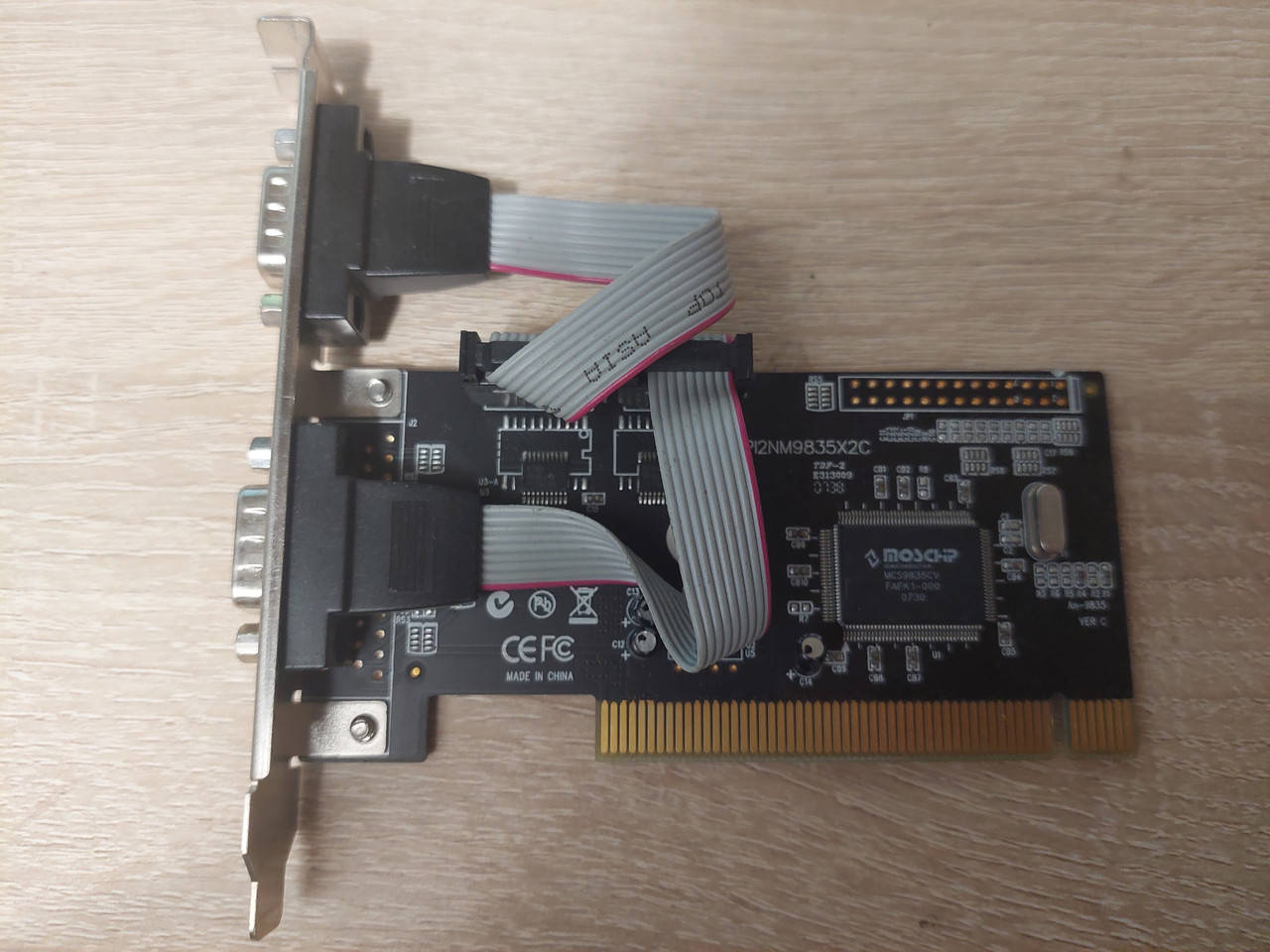 

Контроллер PCI COM-port