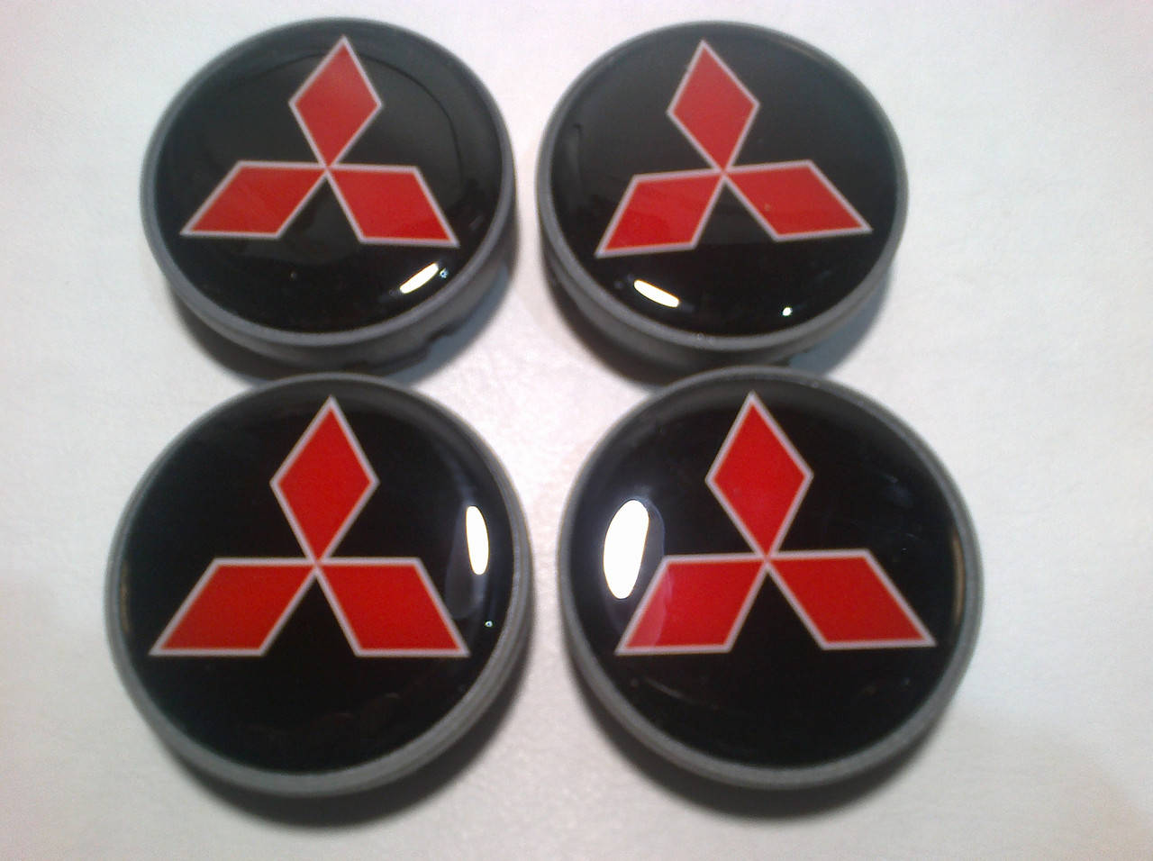 

Колпачки в диск Mitsubishi 55-59 мм