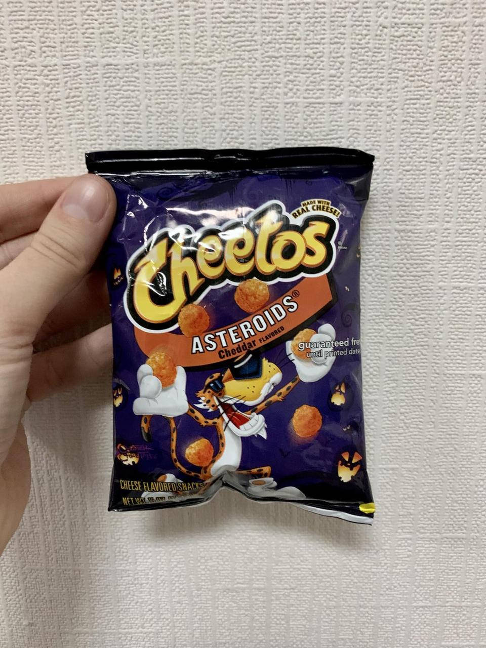 

Снеки Cheetos Cheddar Asteroids 14 g