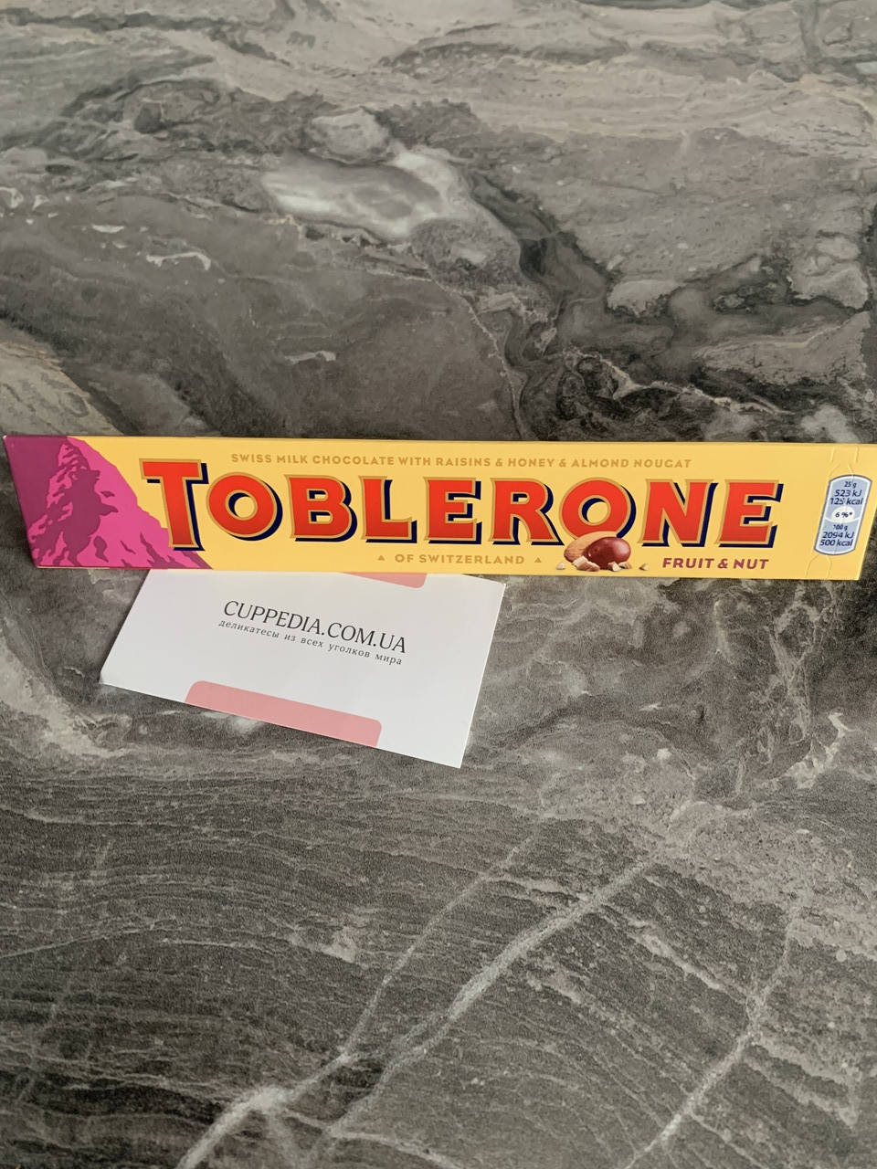 

Молочный шоколад Toblerone с изюмом и миндальной нугой 100 грм