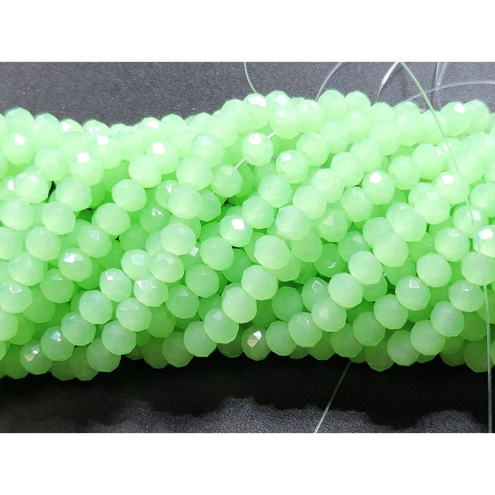 

Хрустальные бусины(рондель). Размер 4 мм. В упаковке прим.140 шт. цвет - светло-зеленый матово-прозрачный
