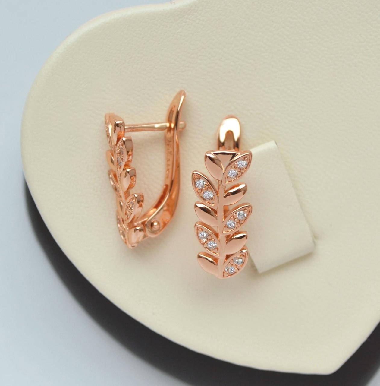 

Позолоченные серьги Веточки с белыми кристаллами.