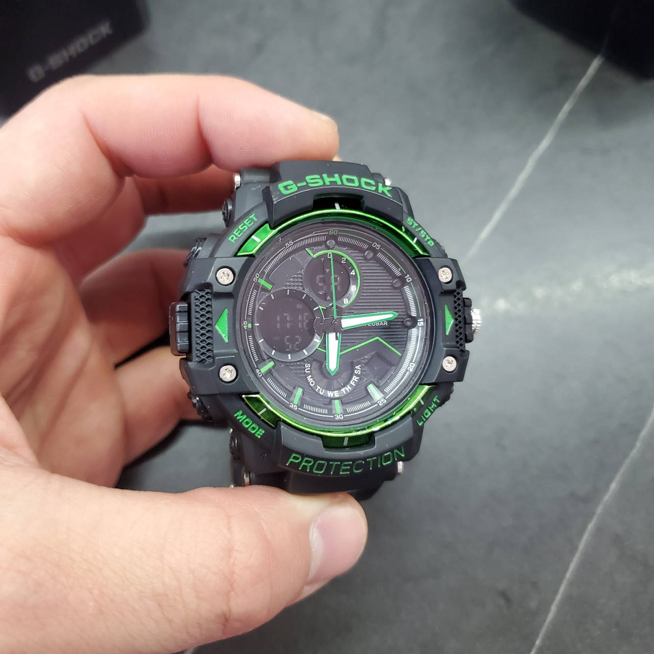 

Спортивные часы Casio C-SHOCK GST-B100X Black-Green, противоударные, водонепроницаемые
