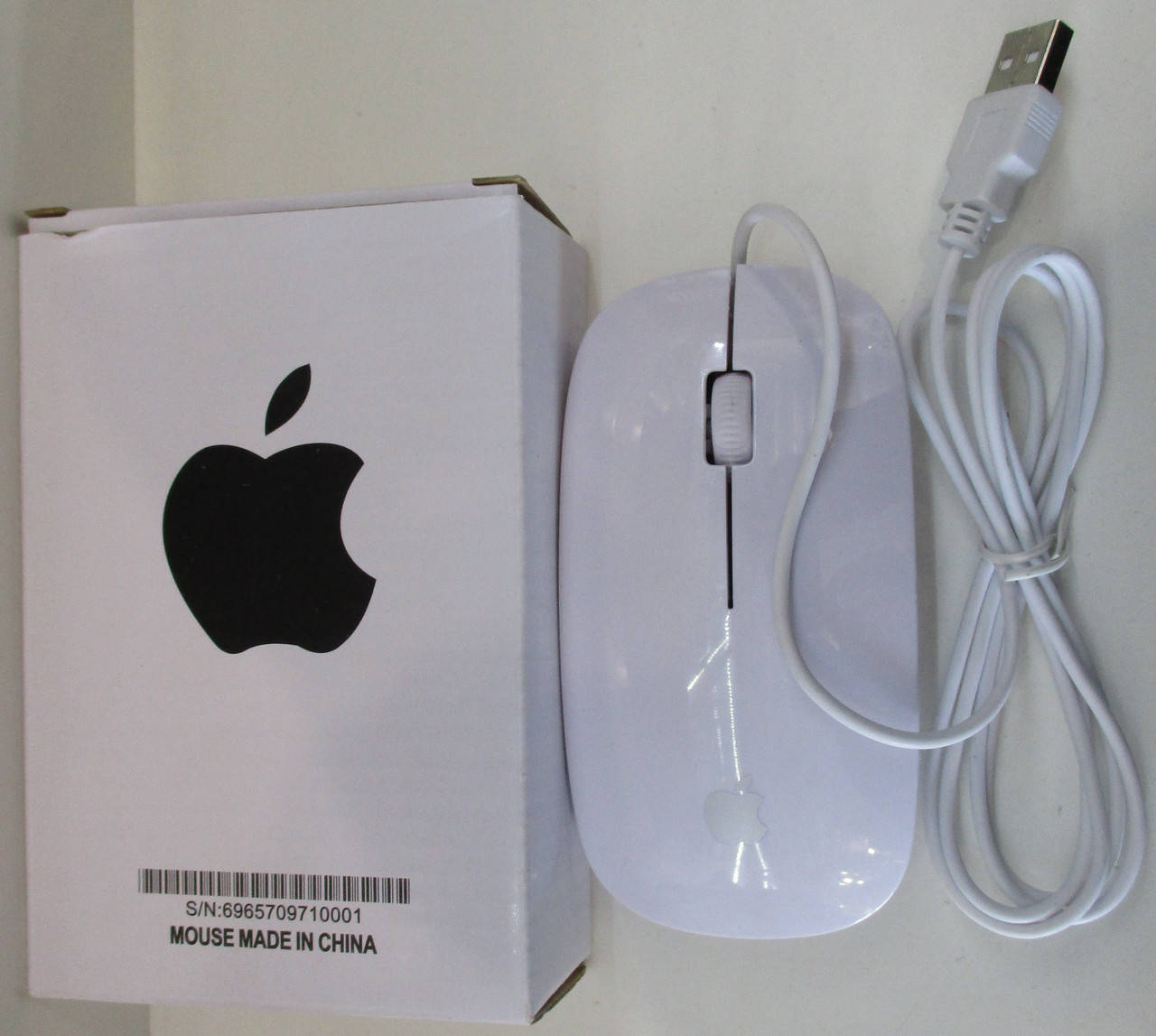 

Проводная мышка Apple А1