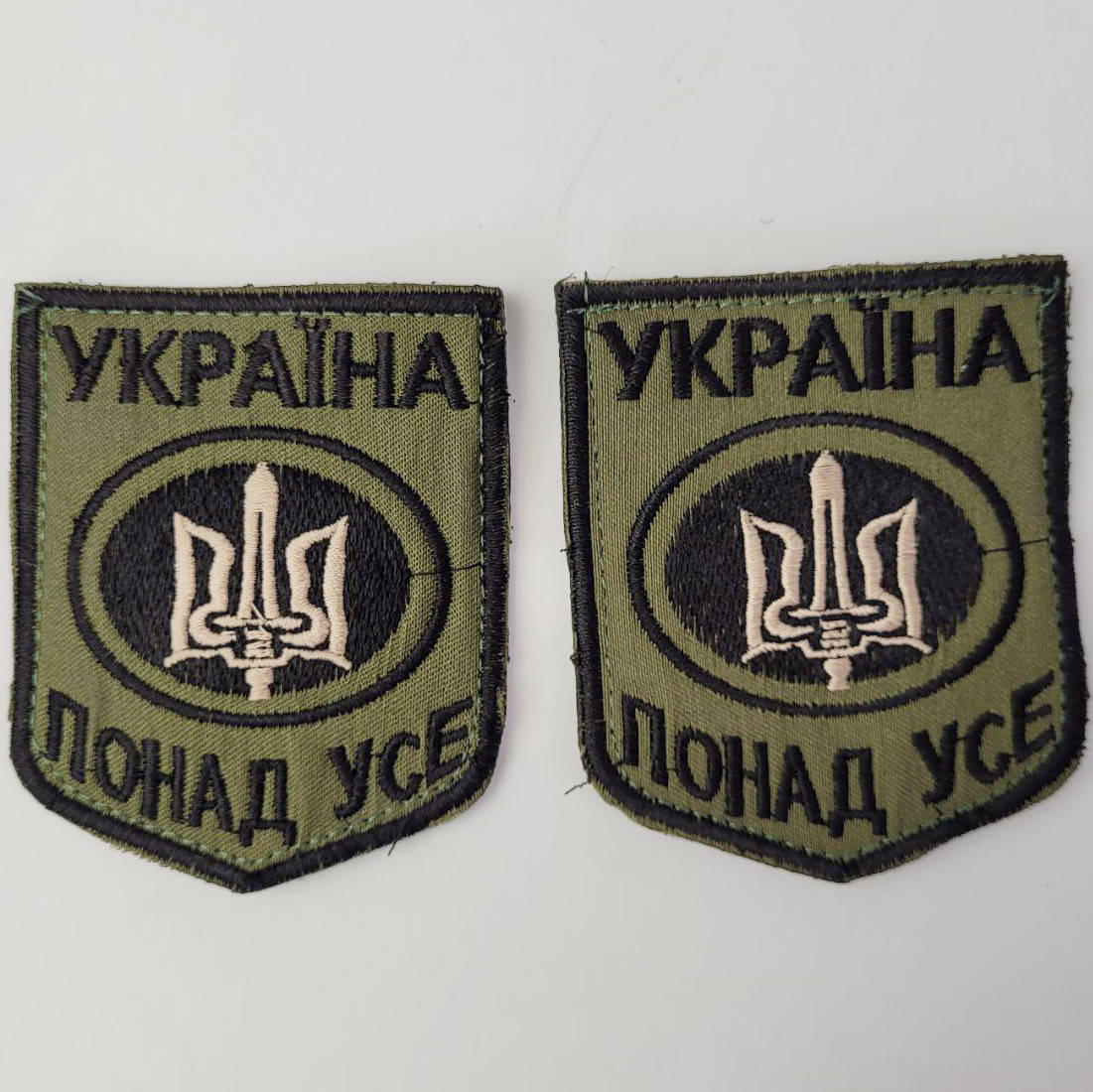 

Шеврон трезубец Украина Превыше всего хаки на липучке