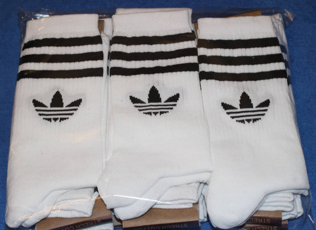 

Носки мужские в стиле Adidas 42-45 размер,высокие,белые. 12 пар.