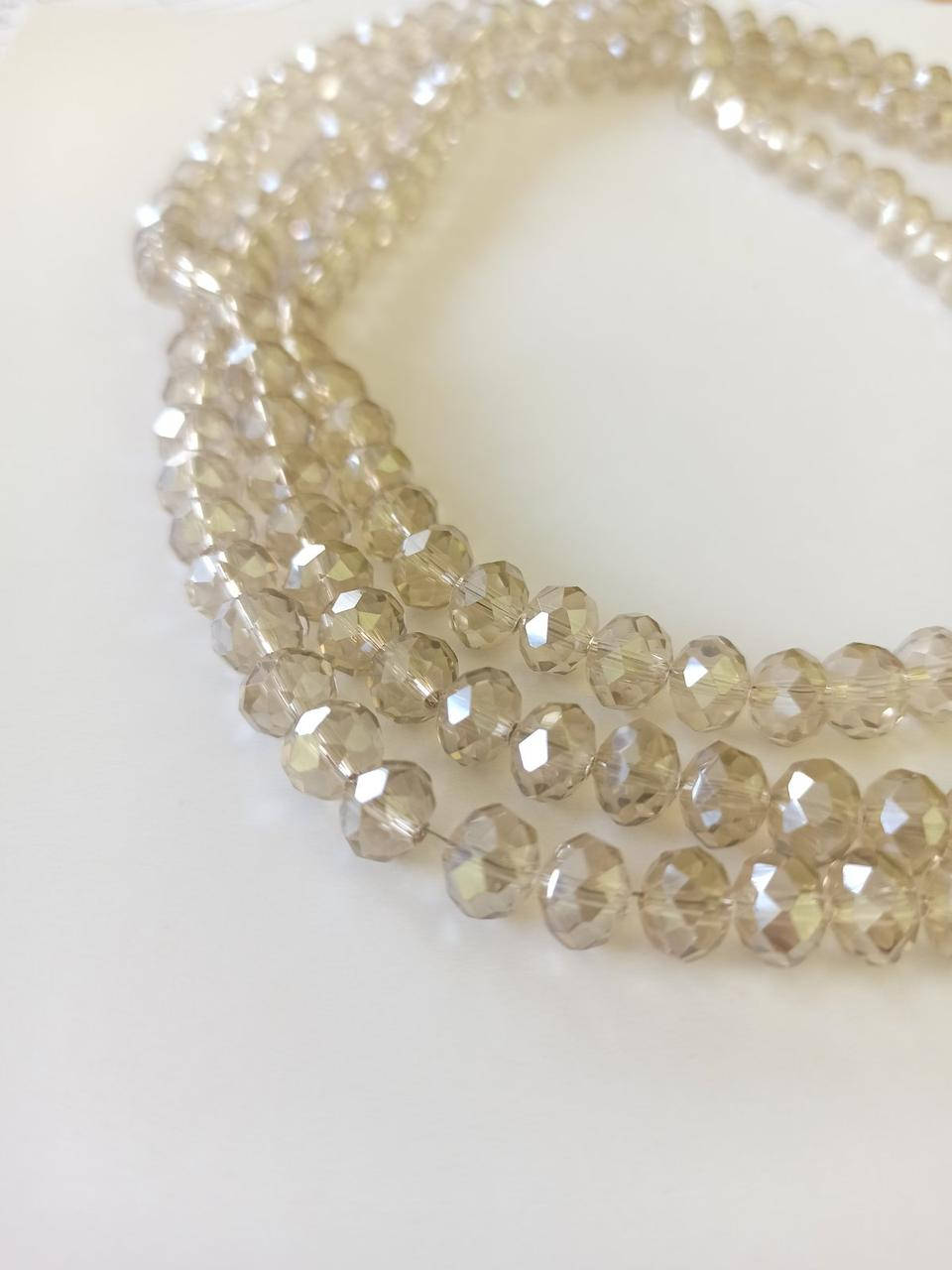 

Бусины хрустальные (Рондель) 8*5 мм пачка 70 шт, цвет - серое шампанское, Серый