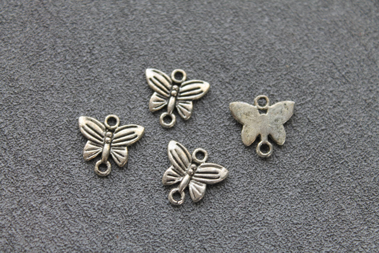 

Фурнитура коннектор бабочка, 13\14 мм, цвет - серебро, 1 шт