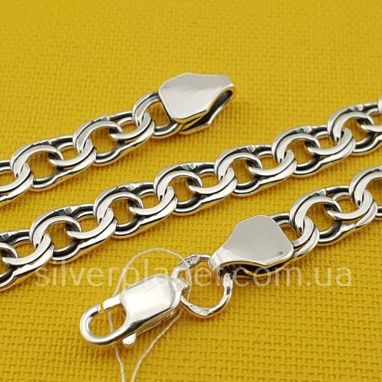 

Серебряная цепь бисмарк плоский. Длина 60 см. Звено 6,5 мм. Серебро 925