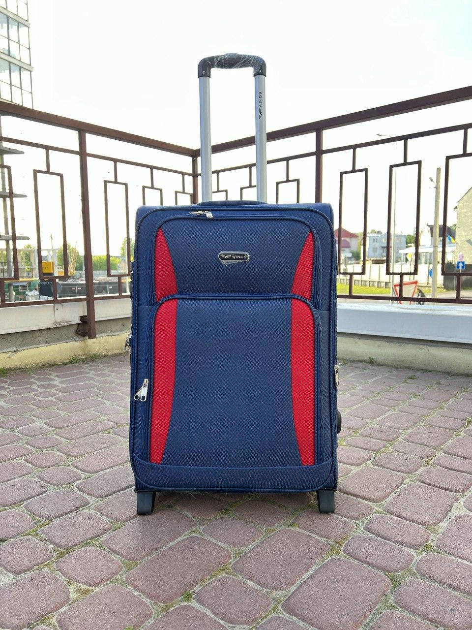 

Чемодан Wings F-23 тканевый  (M) на 2-х колесах Синий