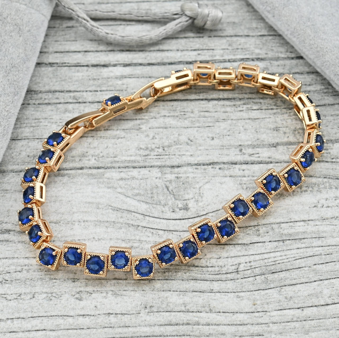 

Браслет Сапфировый король 36235 ширина 7 мм синие фианиты позолота 18К длина 17+2