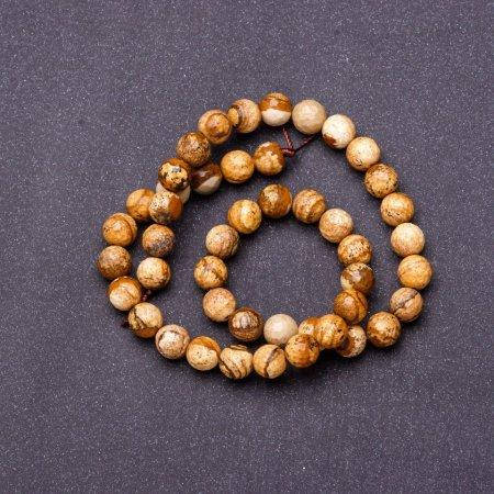 

Бусины натуральный камень на нитке Яшма пейзажная граненный шарик d-8,5(+-)мм L-38см