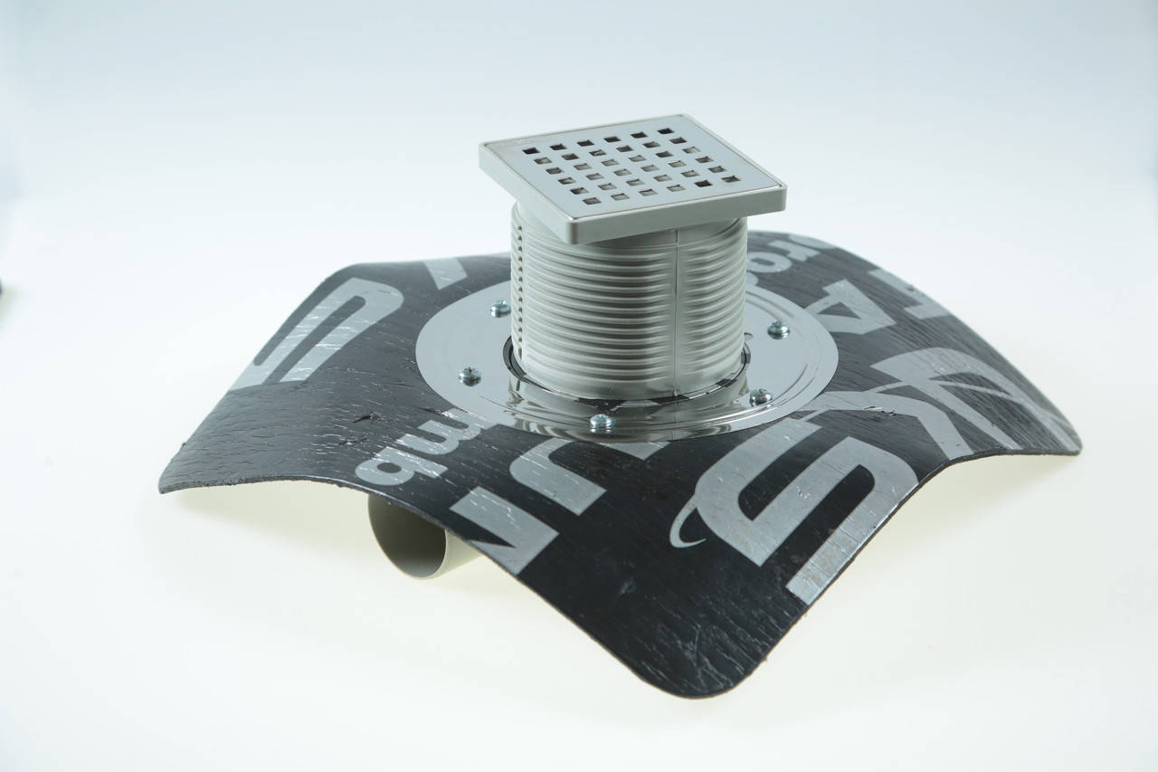 

Двухкорпусный трап 10*10 см с прижимным фланцем и битумной мембраной, гориз. выход D50, сухой затвор, Хром