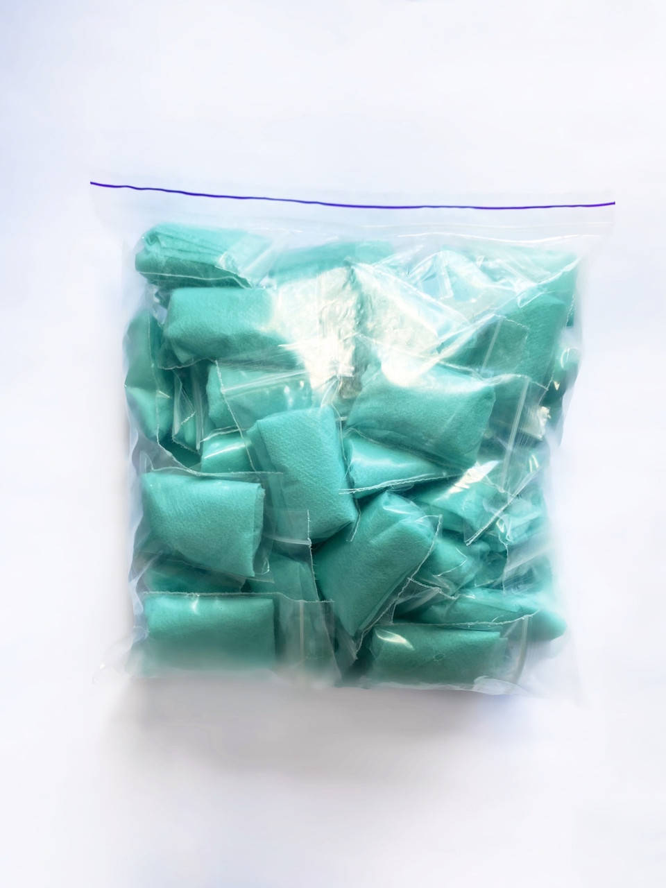 

Трусики-стринги одноразовые Doily ис спанбонда (50 шт/уп.) мятные