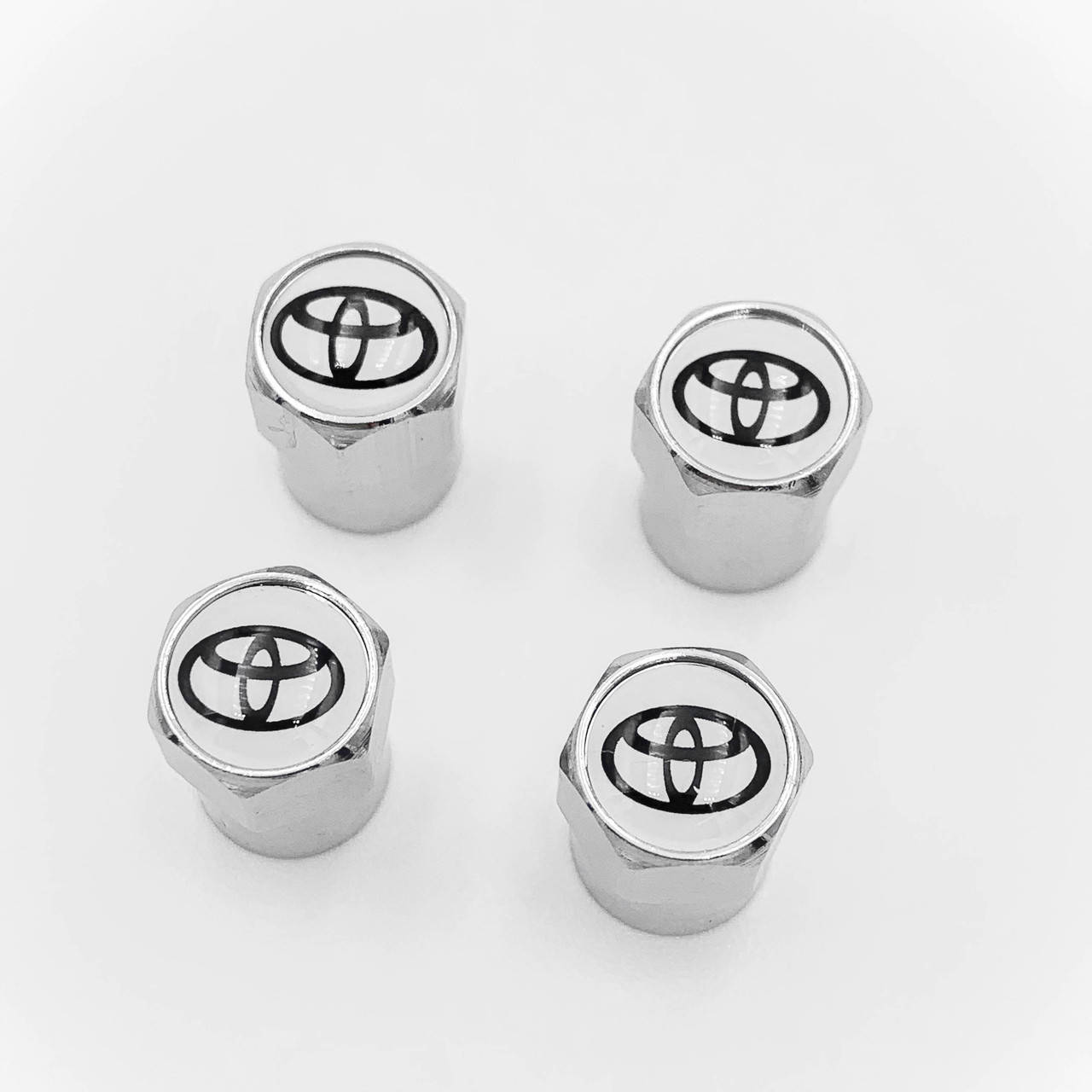 

Защитные колпачки на ниппеля TOYOTA (Тойота) 4 шт Белый фон Хром