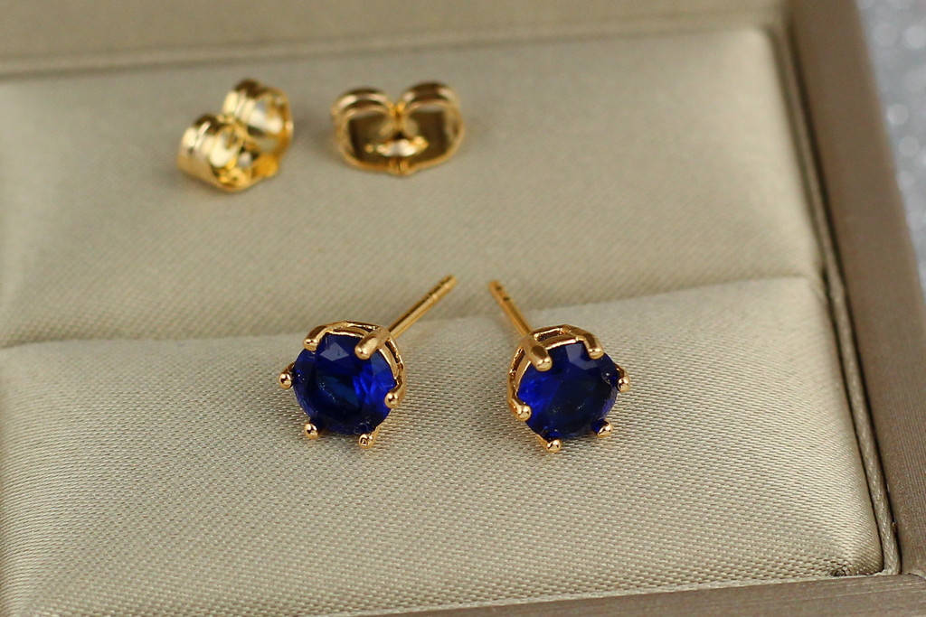 

Серьги гвоздики Xuping Jewelry синий камень на шесть креплений 6 мм золотистые