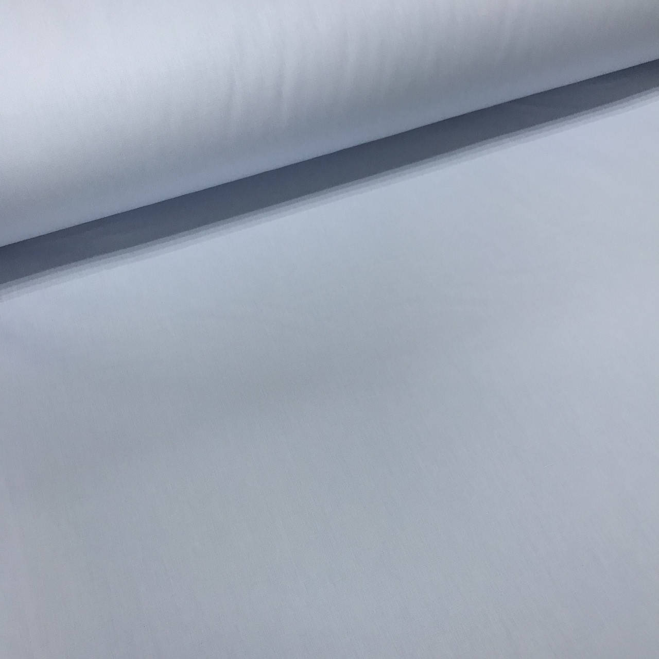 

Ткань поплин De Luxe, однотонный светло-голубой (Турция шир. 2,4 м) №58 (P-FR-0058)